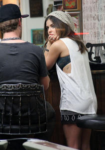 http://img278.imagevenue.com/loc22/th_587011927_LucyHale_ShamrockTattooCandids_September9_2012_8_122_22lo.jpg